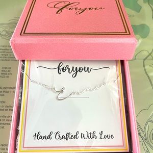 Sterling silver personalized necklace with the name Emme. New in original box